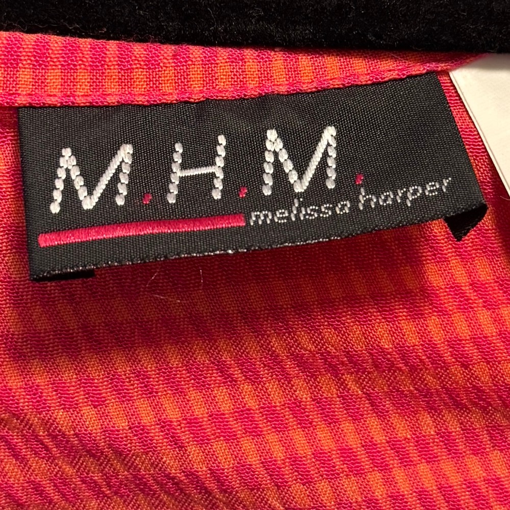 M.H.M. Melissa Harper clothing tag. Approximate date: 1990s.