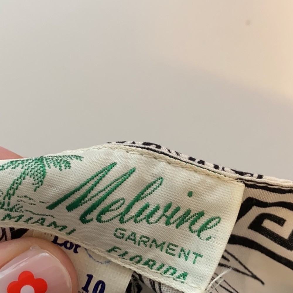 Melwine clothing tag. Approximate date: 1960s. Recorded notes: Melwine, Miami, Florida. Melwine was incorporated in 1950 and dissolved in 1983.