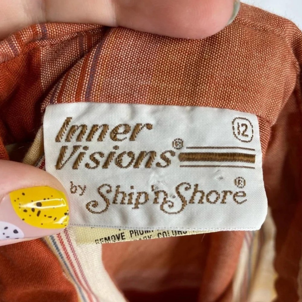 Ship 'n Shore clothing tag. Approximate date: 1980s. Recorded notes: 1986- Evidence of Inner Visions by Ship 'N Shore appears in Newspaper ad (The Cherokeean, 09/11/86)
1990- INNER VISIONS BY SHIP 'N SHORE trademark application filed
1995- Trademark application abandoned